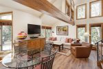 Towering stone fireplace & flat screen TV